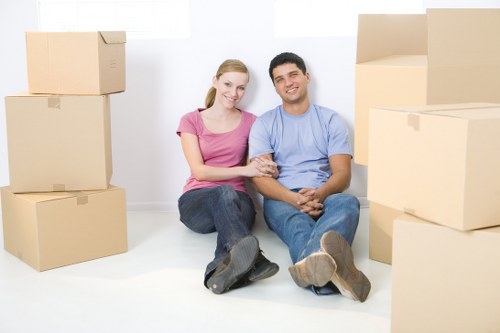 Reliable movers in Shoreditch loading items for transport