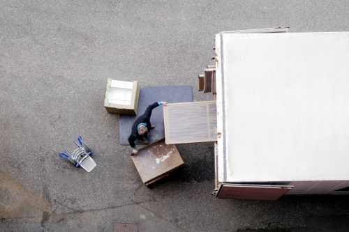 Mover handling furniture carefully as part of a relocation service