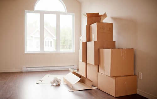 Fragile items being wrapped and packed for a move in Shoreditch