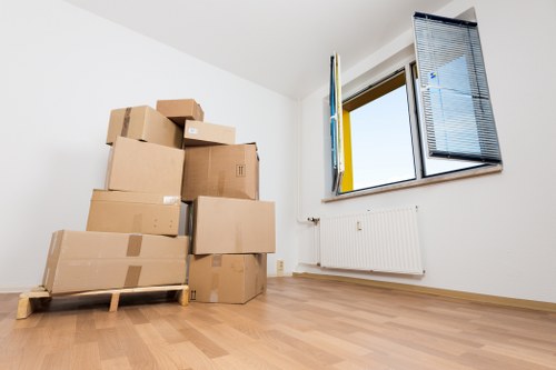 Packed boxes and furniture ready for a flat move in Shoreditch