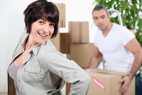 Team handling office furniture during a local Shoreditch relocation